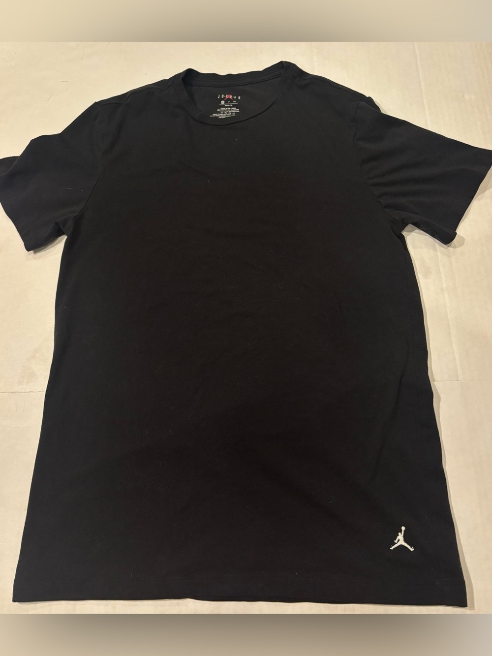 Jordan Men’s Black Short Sleeve Crew Tee with Small White Jumpman